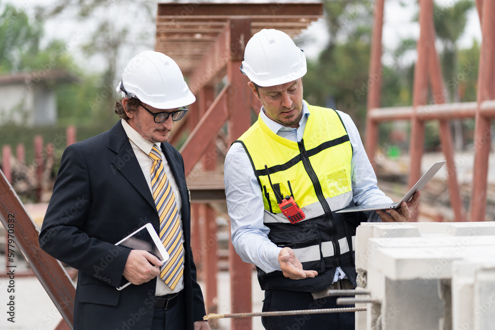 Portrait caucasian engineer man working with team engineer work at precast site work Portrait caucasian engineer man working with team engineer work at precast site work