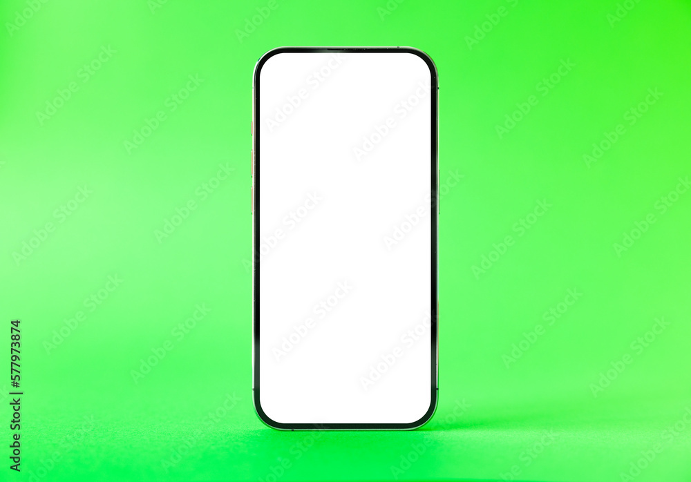 Mobile phone mockup on fresh green background Mobile phone mockup on fresh green background