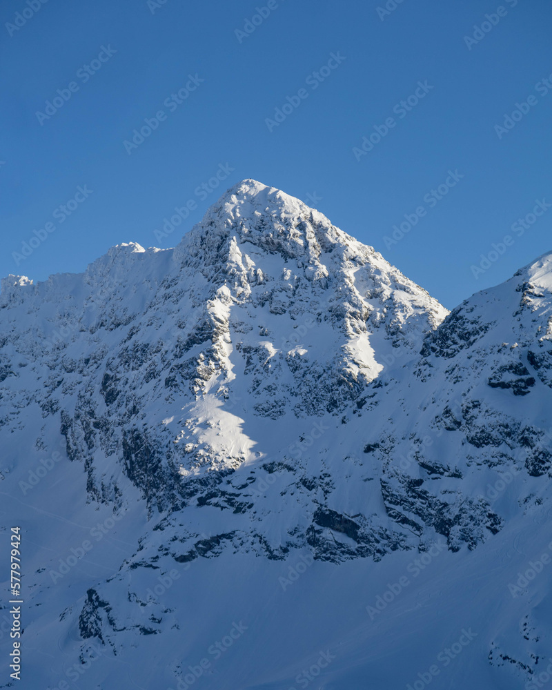 mountain peek in winter covered in snow
