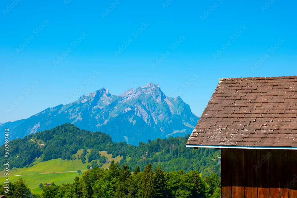Rooftop and Mountain Peak Pilatus with Clear Blue Sky in Burgenstock, Nidwalden, Switzerland.