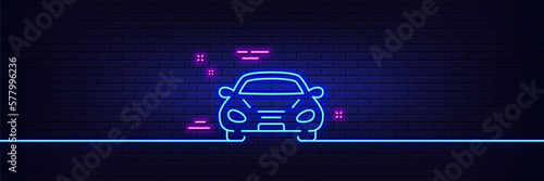 Neon light glow effect. Car transport line icon. Transportation vehicle sign. Driving symbol. 3d line neon glow icon. Brick wall banner. Car outline. Vector
