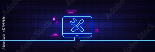 Neon light glow effect. Repair computer line icon. Device service sign. Fix tv symbol. 3d line neon glow icon. Brick wall banner. Repair outline. Vector