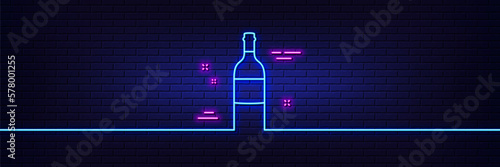 Neon light glow effect. Wine bottle line icon. Merlot or Cabernet Sauvignon sign. 3d line neon glow icon. Brick wall banner. Wine bottle outline. Vector
