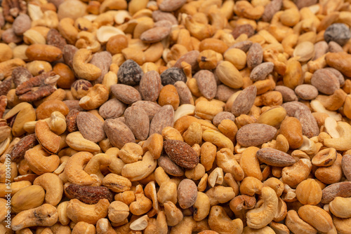 A group of almonds, pistachios, walnuts, macadamia, cashews.