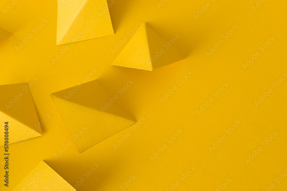 Abstract yellow background with triangle geometric shapes Abstract yellow background with triangle geometric shapes