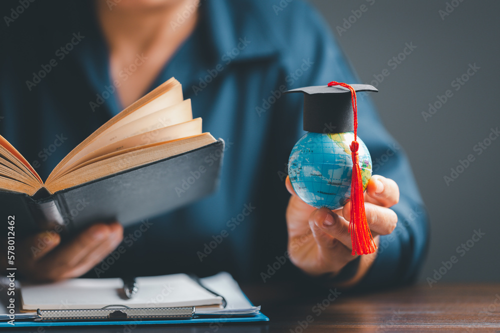 Graduation cap with Earth globe. Concept of global business study, abroad educational, Back to School. Education in Global world, Study abroad business in universities in worldwide. language study - obrazy, fototapety, plakaty 