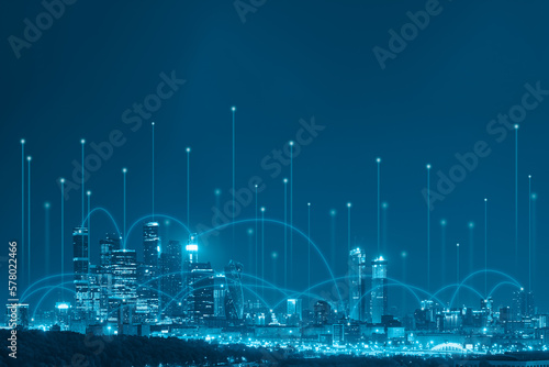 Business communication lines over the city. Technology connectivity in the city in blue tone. Smart city and wireless communication network concept. Digital network connection lines