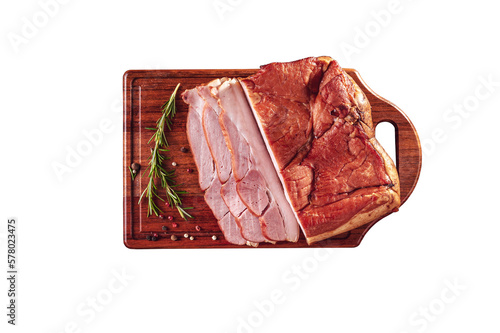 Fresh bacon with rosemary sprig on a wooden cutting board. Isolated in top view.
