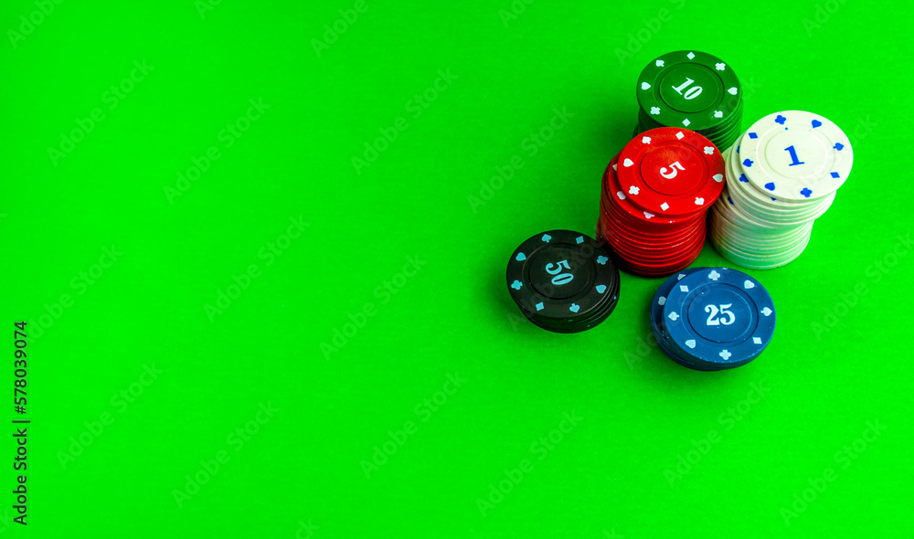 Poker game, Stacks of chips on a green table. Poker game, Stacks of chips on a green table.