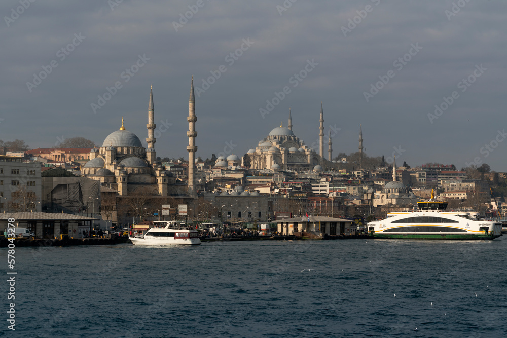 View of the Fatih district of Istanbul from the water of the Golden Horn Bay, Suleymaniye Mosque, New Mosque on a sunny day,Istanbul, Turkey