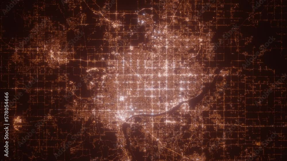 Tulsa (Oklahoma, USA) top view at night. Aerial view on modern city with lights. Camera is flying above the city, moving backward. Vertical video. The north is on the left side Tulsa (Oklahoma, USA) top view at night. Aerial view on modern city with lights. Camera is flying above the city, moving backward. Vertical video. The north is on the left side