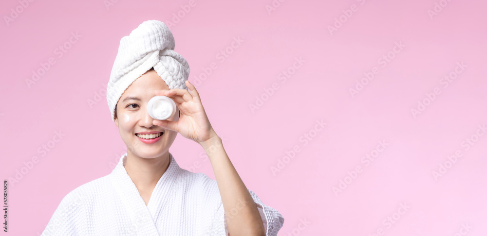 Young asian woman applying facial skincare face cream, cosmetic moisturiser on healthy natural skin make up face. Portrait glowing smile girl person model with care beauty product, spa, cosmetology. Young asian woman applying facial skincare face cream, cosmetic moisturiser on healthy natural skin make up face. Portrait glowing smile girl person model with care beauty product, spa, cosmetology.