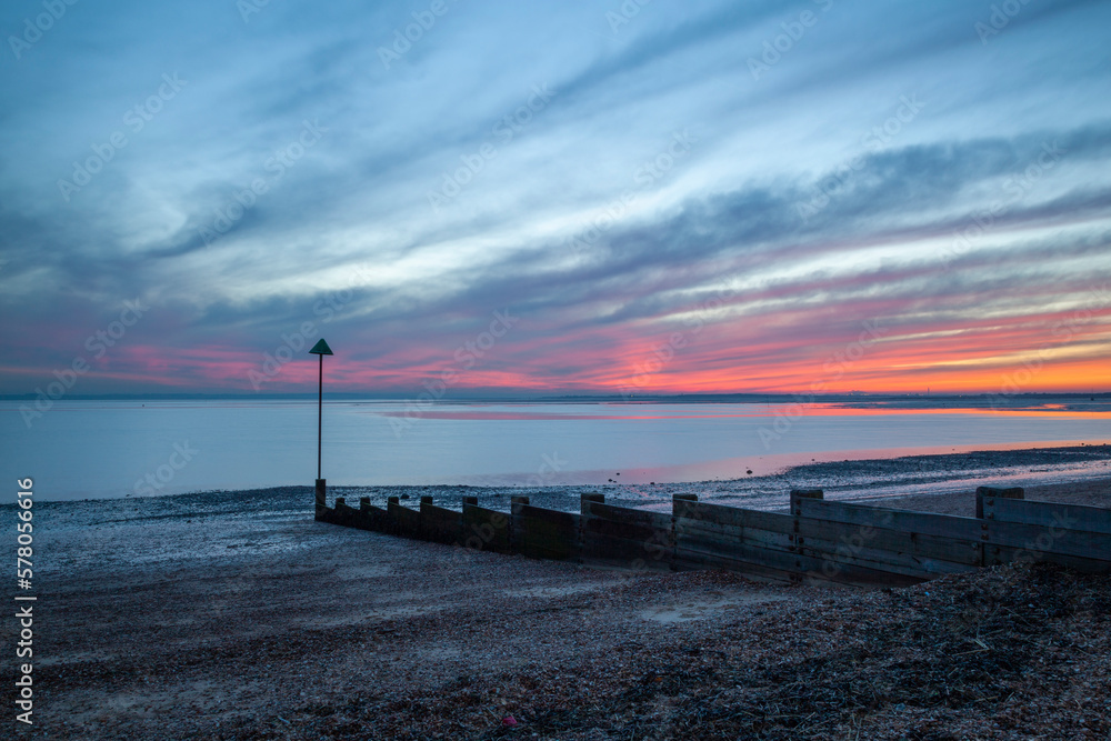 Winter sunset on Chalkwell beach, Essex, England, United Kingdom