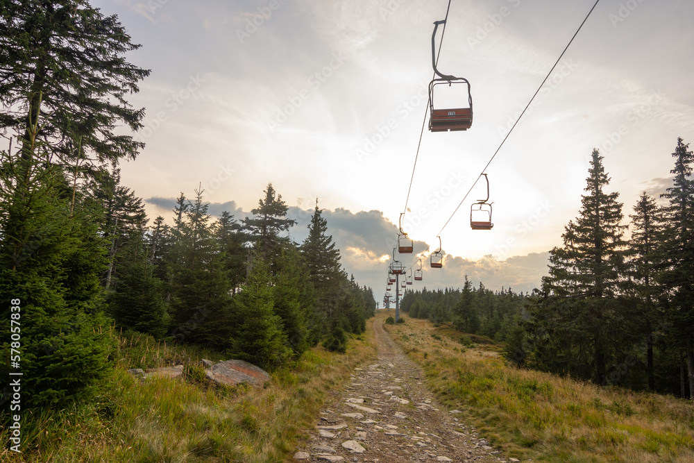 Φωτογραφία Romantic hiking trail to the top of Serak in Jeseniky mountains in Czech republic from Ramzova and chairtrails in background at sunset