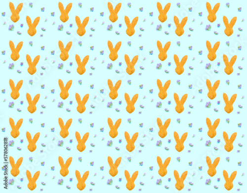 Pattern of rabbit ears on green background. Happy Easter concept. Wrapping paper or textile design. 