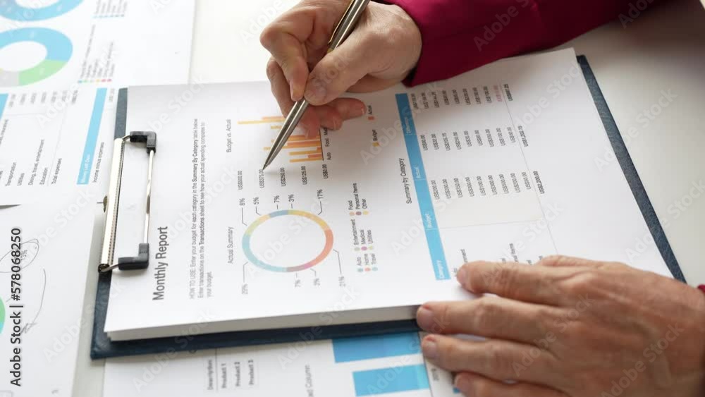 Close up Business Person research and analysis with financial graph at office. Strategy, chart, finance report concept. Close up Business Person research and analysis with financial graph at office. Strategy, chart, finance report concept.