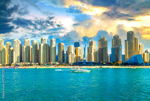 An exquisite postcard view of Dubai featuring modern architecture, luxurious yachts, and the sparkling sea