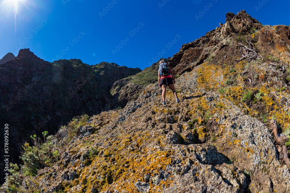 Female hiker hiking the mountains of Teno Alto in Tenerife Canary Islands