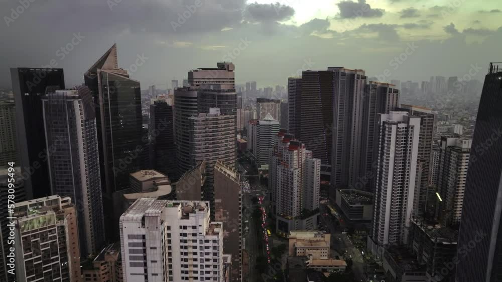 Flying Over The Evening Glowing Manila, Philippines, Aerial View Flying Over The Evening Glowing Manila, Philippines, Aerial View