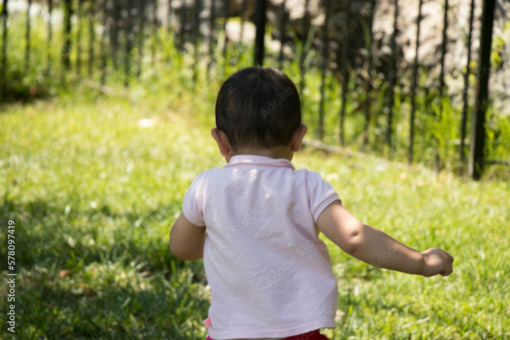Little boy learning to run in nature. Stock photo. Little boy learning to run in nature. Stock photo.