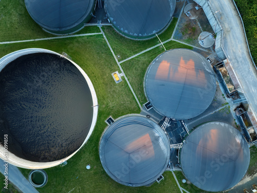 
Vertical view of the process components, fermenters and biogas storage tanks of the agricultural biogas plant. Use of biogas in cogeneration units for electricity and heat production.