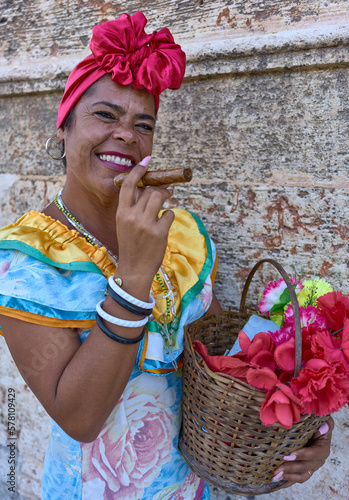 Photography Cuban canastera with habano flowers and typical costume
