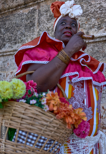 Cuban canastera with habano flowers and typical costume
