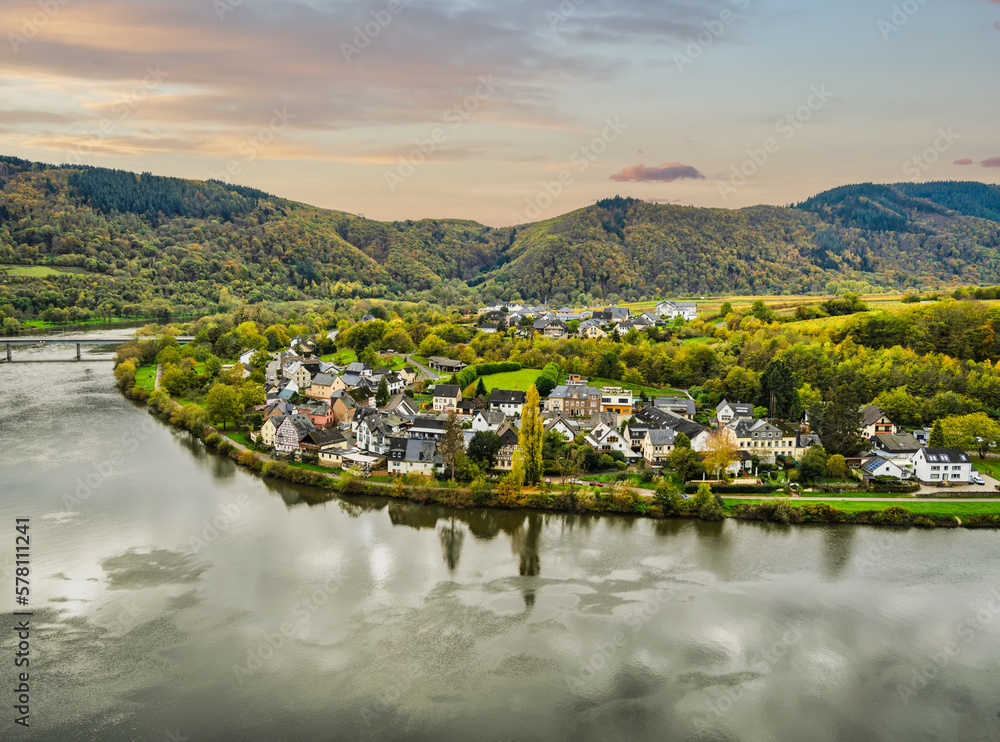 Senhals village on the Moselle river bend and the mountain range in the background in Cochem-Zell district, Germany