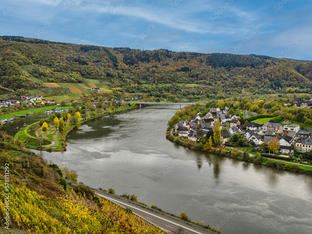 Senhals and Senheim on either side of the Moselle river with lush mountain in the background in Cochem-Zell district, Germany