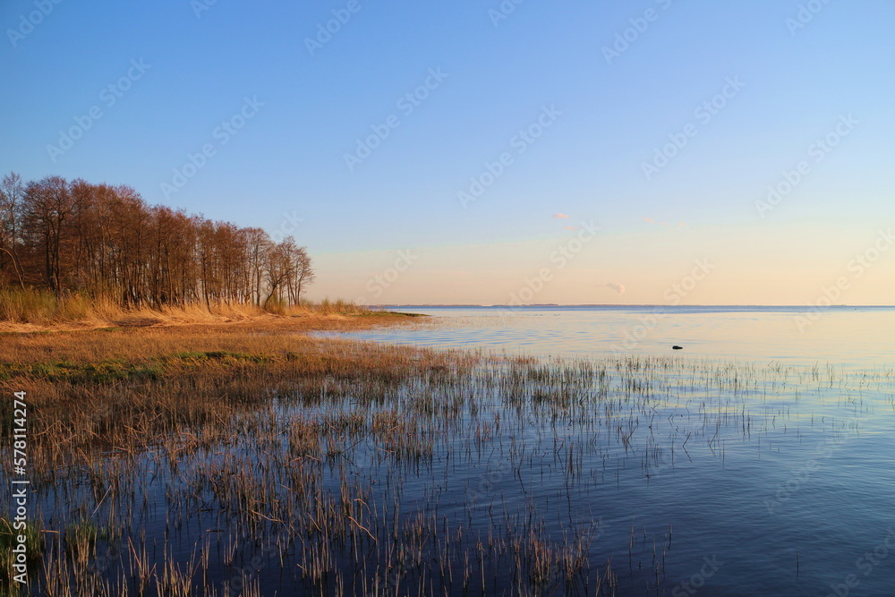 lake golden hour,  autumn landscape, yellow forest blue calm smooth water