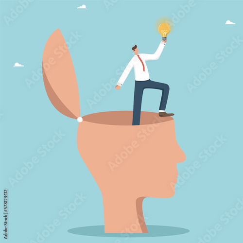Brilliant thoughts in a smart head, develop a plan to overcome difficulties, find the right long-term strategy for the development of a new business, a man found an idea light bulb in a big human head