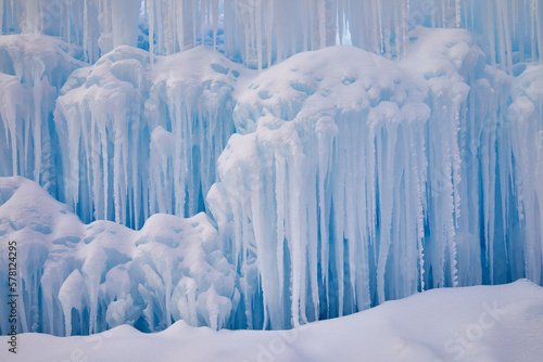 Beautiful giant snow covered icicles on a freezing cold day in January near Minneapolis Minnesota USA © Jill Greer