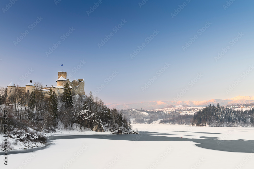 Winter panorama of Niedzica Castle on the River Dunajec. Poland