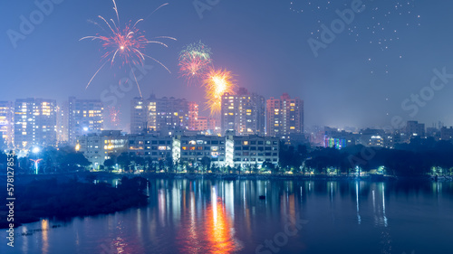 Hyderabad cityscape in Telangana, India. illuminated with Diwali festival fireworks. © SNEHIT PHOTO