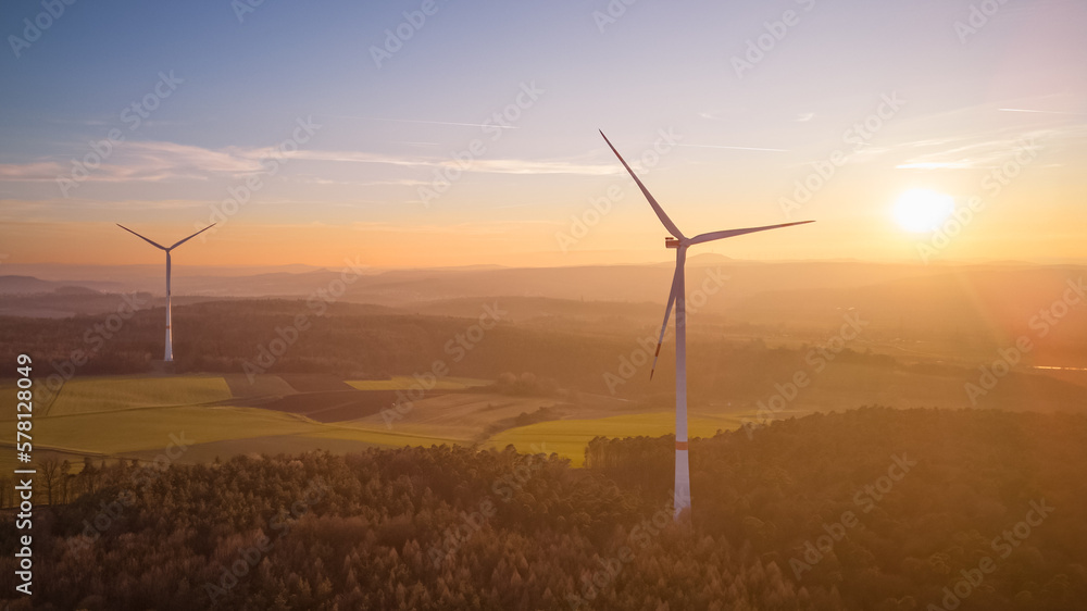 wind turbines in the countryside at sunset wind turbines in the countryside at sunset