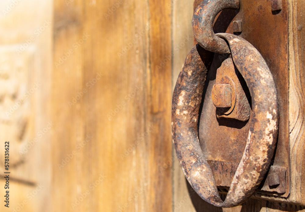 Worn, weathered, interesting Door Knocker on old wooden door Worn, weathered, interesting Door Knocker on old wooden door