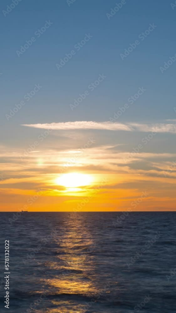 Sunset on the sea, vertical time-lapse Sunset on the sea, vertical time-lapse