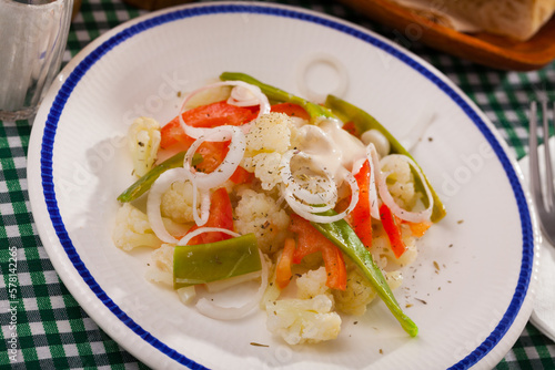 Appetizing cauliflower salad closeup. High quality photo