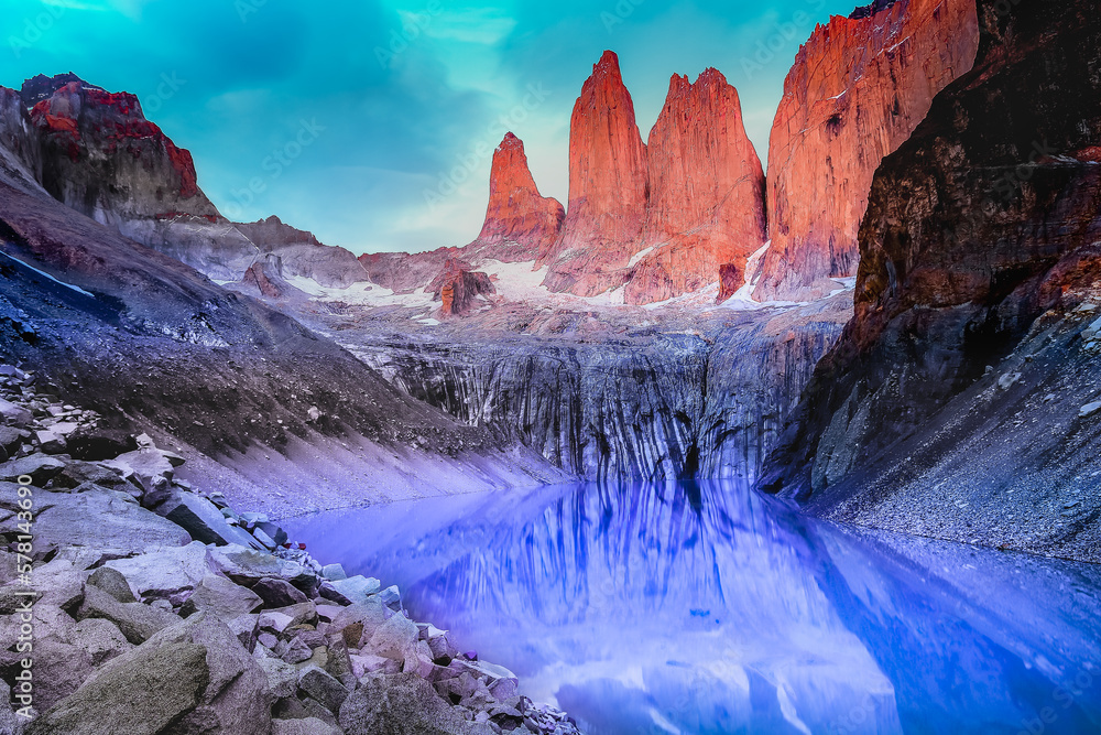 Torres Del Paine granites at sunrise and lake reflection, Chilean Patagonia