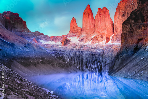 Torres Del Paine granites at sunrise and lake reflection, Chilean Patagonia