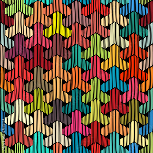 The seamless bohemian pattern. Imitation of embroidery. Geometric multicolored abstract. Vector illustration.