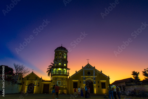sunset in front of the church of santa barbara in mompox photo
