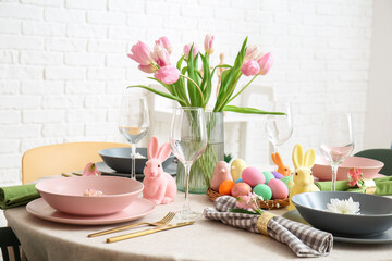 Beautiful table setting for Easter celebration in dining room