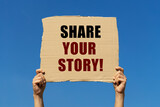 Share your story text on box paper held by 2 hands with isolated blue sky background. This message board can be used as business concept to inform audience to share their story.