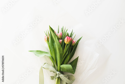 Bouquet of pink fresh tulips. Beautiful Card for Mother's Day or Women's Day.