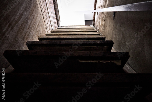 The stairs lead up from the dark basement to the light. The end of the quest, a special dark room for conducting quests. Recreation for the brave