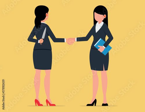 Treacherous deal, Hiding killer concept. Two business woman shaking each other hands while one holding knife behind back.