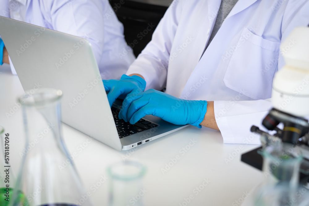 Scientist Doing Experiment in Agriculture Lab to Develope Genetic Modification Crops Scientist Doing Experiment in Agriculture Lab to Develope Genetic Modification Crops