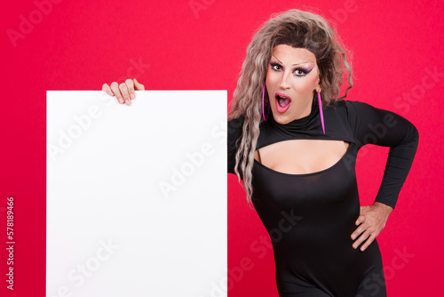 Konstfotografi Surprised transgender person with make up holding a blank panel