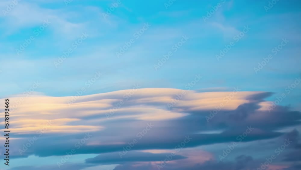 Majestic clouds moving in sky during sunset, fusion time lapse Majestic clouds moving in sky during sunset, fusion time lapse